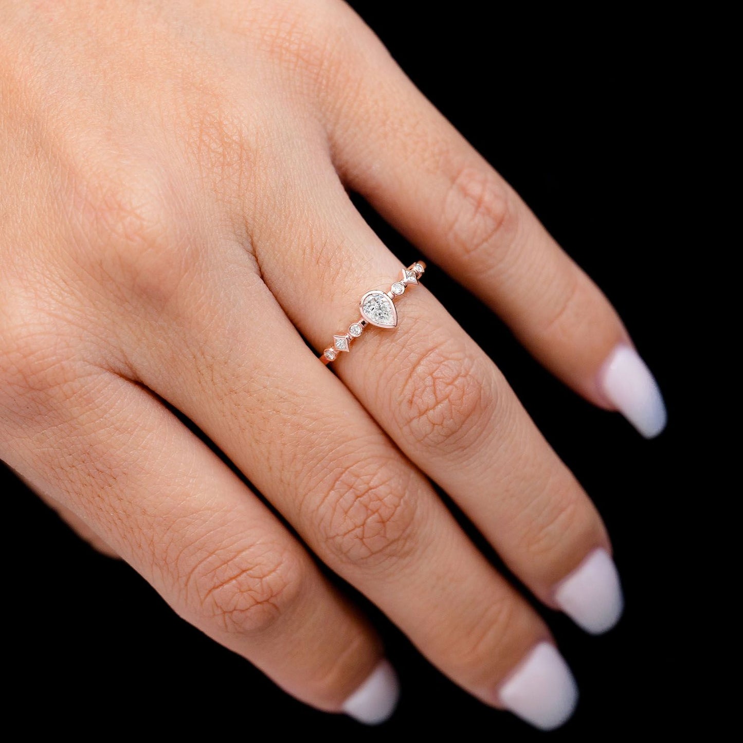 0.30CTW DIAMOND PEAR BEZEL GEOMETRIC SHANK ENGAGEMENT RING