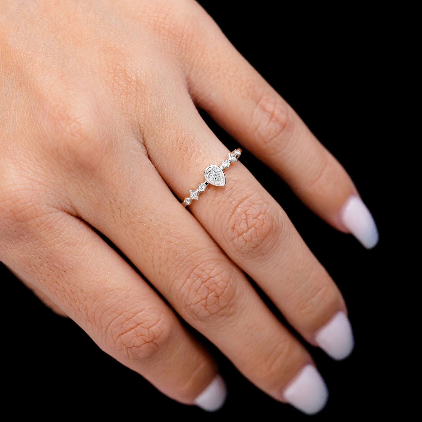 0.30CTW DIAMOND PEAR BEZEL GEOMETRIC SHANK ENGAGEMENT RING
